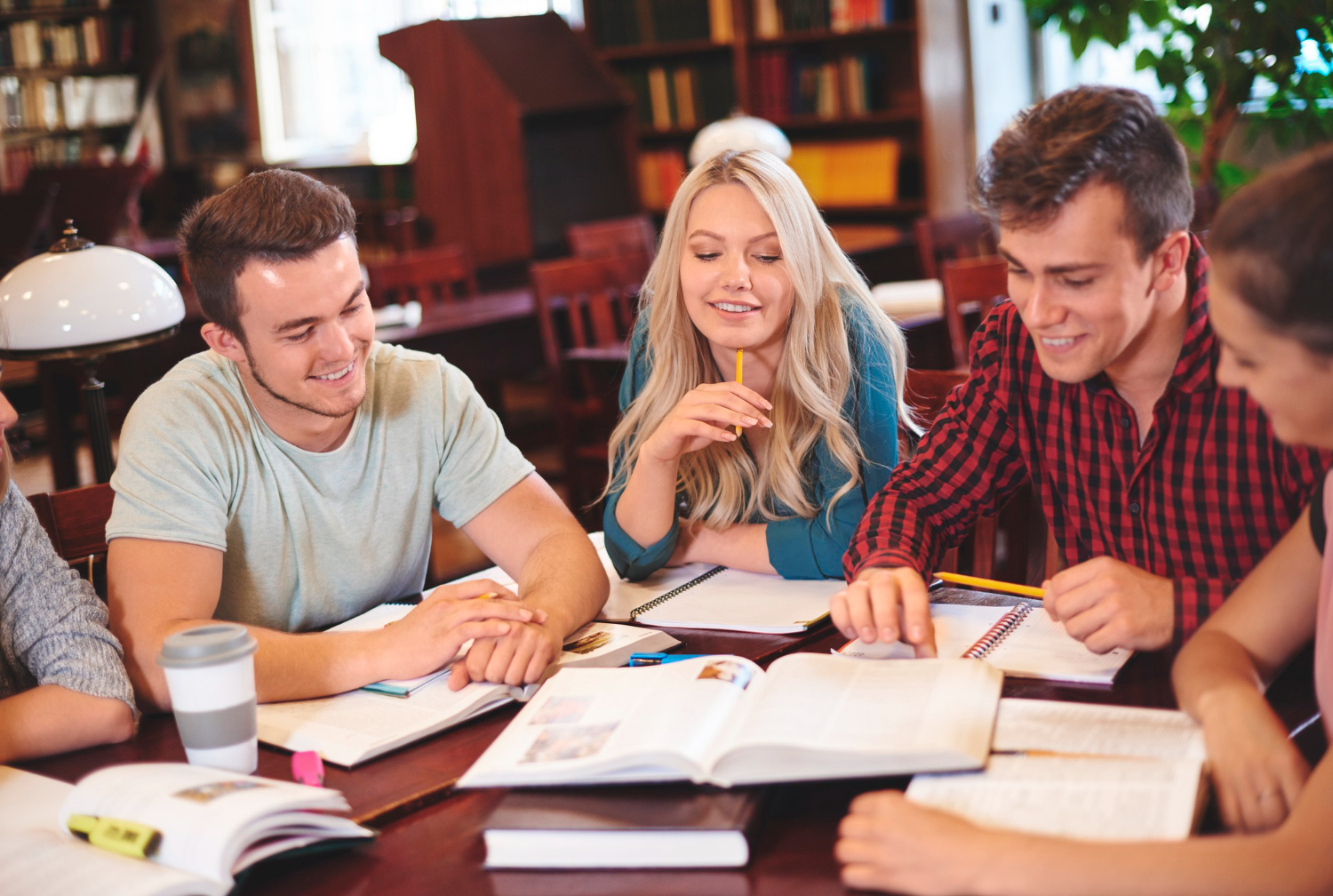 Students are studying together in the library