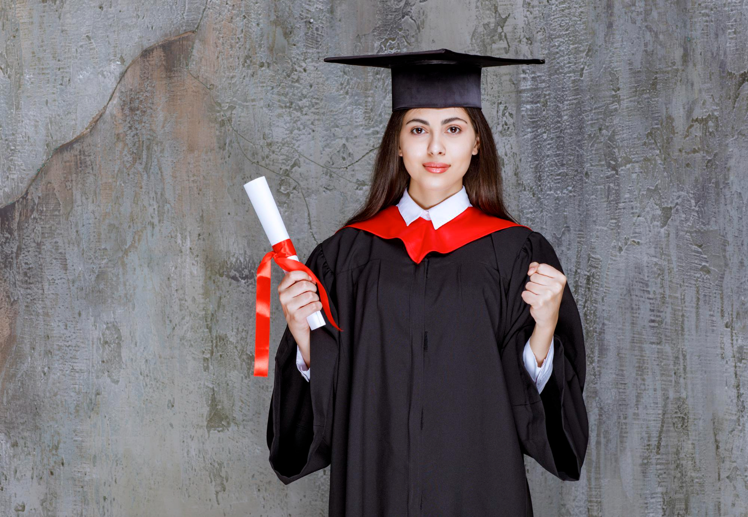 Female student with graduation certificate